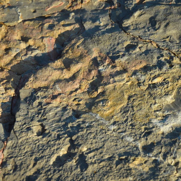 非常に硬い岩のテクスチャ 自然な青と黄色の石のテクスチャ 背景や壁紙 — ストック写真