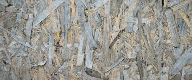 OSB panelinin ahşap talaşından yapılmış dokusu, eski ahşap levhalar, arka plan olarak kullanılabilir