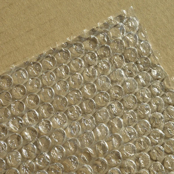 波纹纸板纸上塑料气泡保护箔包装纹理背景 气泡填料纹理 — 图库照片