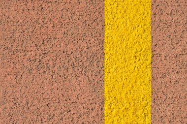 Temiz asfalt sarı yol dokusu arka plan görünümlü, kırmızı asfalt çizgisi dikişsiz 