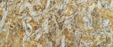 OSB panelinin ahşap talaşından yapılmış dokusu, eski ahşap levhalar, arka plan olarak kullanılabilir