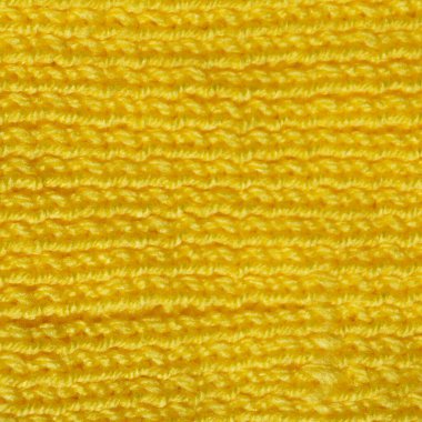 Yünden desenli kumaş. El yapımı örgü kumaş sarı yün arkaplan dokusu