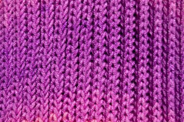 Yünden desenli kumaş. El yapımı kumaş mor yün arkaplan dokusu