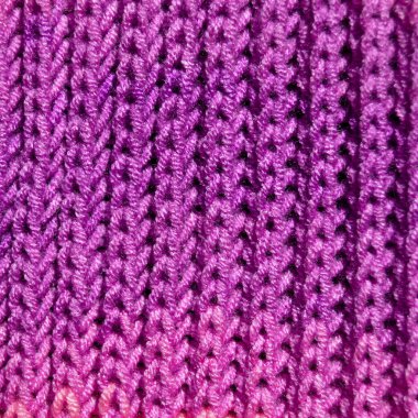 Yünden desenli kumaş. El yapımı kumaş mor yün arkaplan dokusu