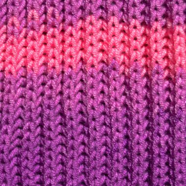 Yünden desenli kumaş. El yapımı kumaş mor ve pembe yün arkaplan dokusu