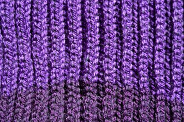 Yünden desenli kumaş. El yapımı kumaş mor yün arkaplan dokusu