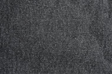 Kusursuz siyah kot pantolon kumaş kumaş arka plan ve duvar kağıdı.