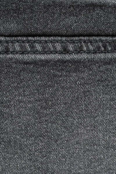 Dikiş siyah kot pantolon kumaş kumaş arka plan ve duvar kağıdı