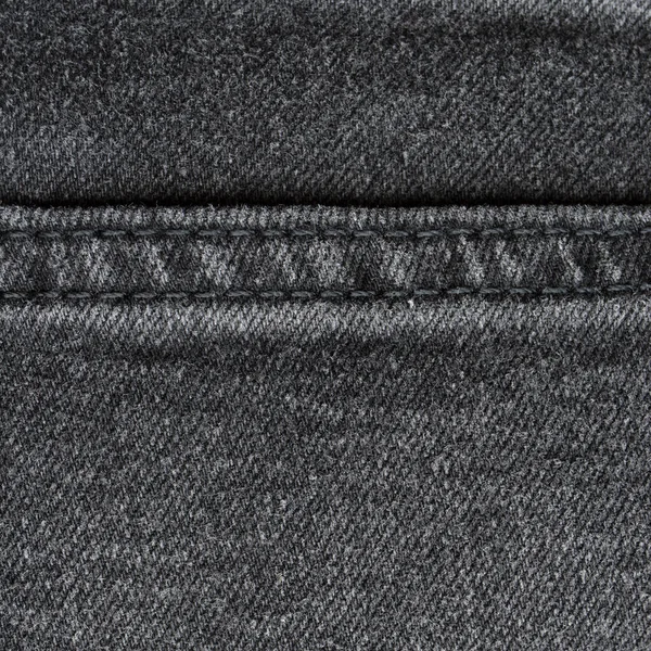 Dikiş siyah kot pantolon kumaş kumaş arka plan ve duvar kağıdı