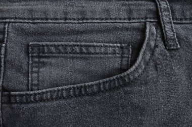 Açık siyah kot pantolon cebinin detaylarını kapat