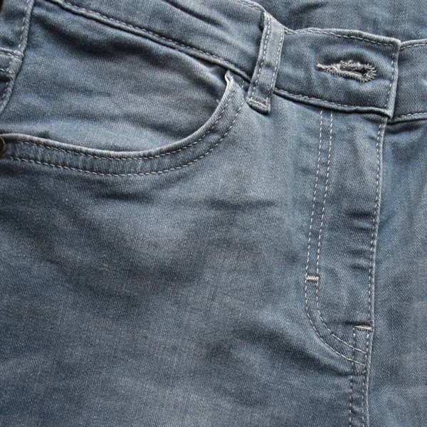Fermuar Cebi Düğmeler Açık Mavi Kot Pantolonun Ahşap Zemindeki Yakın — Stok fotoğraf