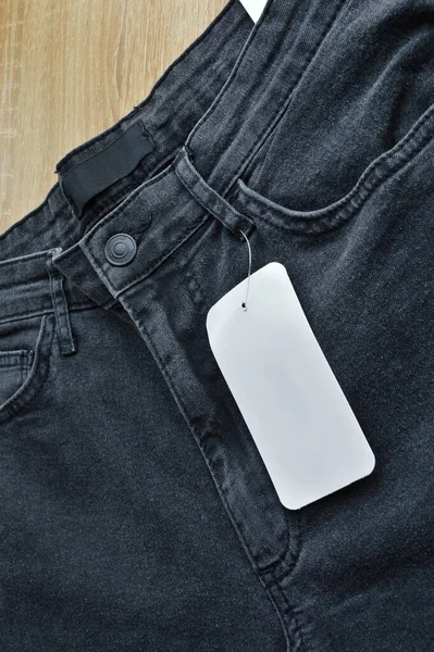 Zipper Pocket Buttons Black Jeans Denim Blank Sale Tag Paper — Stock Photo, Image