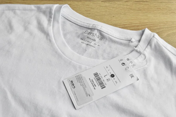 New White Bershka Shirt Blank Label Wooden Floor May 2022 — Stock Photo, Image