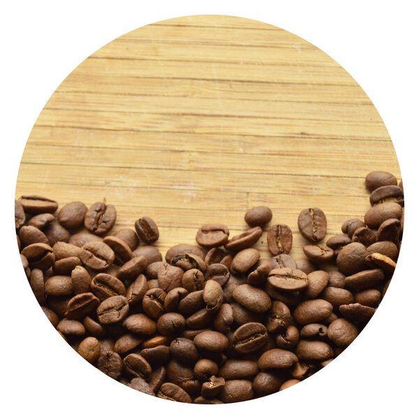 Carefully selected and roasted fresh coffee beans, on a wooden background