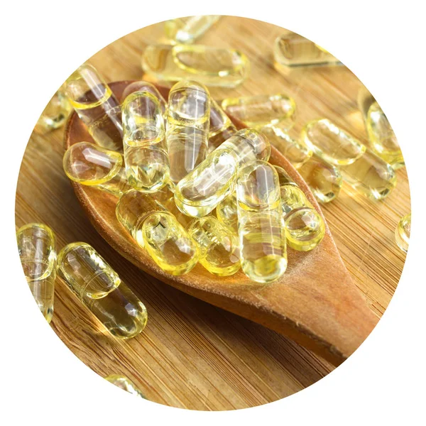 Gelbes Fischöl Ovale Tablette Tabletten Holzlöffel Auf Bambus Schneidebrett Medizinische — Stockfoto