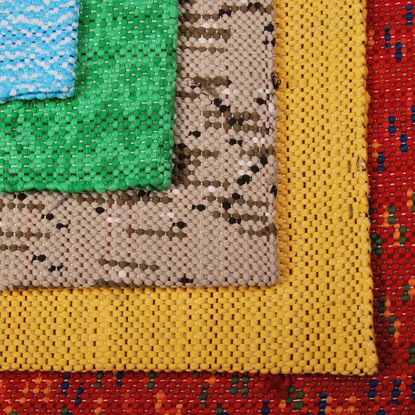 手作りのカラーカーペットやラグの織り カラフルなラグのテクスチャ カーペット材料パターンテクスチャ床 — ストック写真