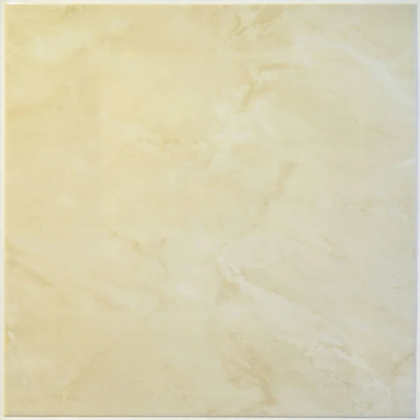 Beige square ceramic tile seamless, can be used indoors and outdoors, on a wall as a background