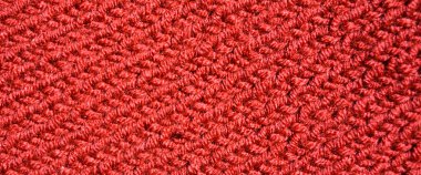 Yünden desenli kumaş. El yapımı kumaş, kırmızı yün arkaplan dokusu