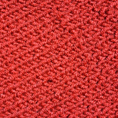 Yünden desenli kumaş. El yapımı kumaş, kırmızı yün arkaplan dokusu