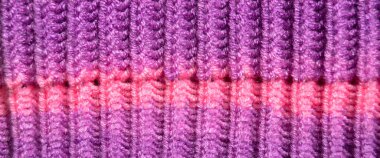 Yünden desenli kumaş. El yapımı kumaş mor ve pembe yün arkaplan dokusu