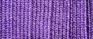 Yünden desenli kumaş. El yapımı kumaş mor yün arkaplan dokusu