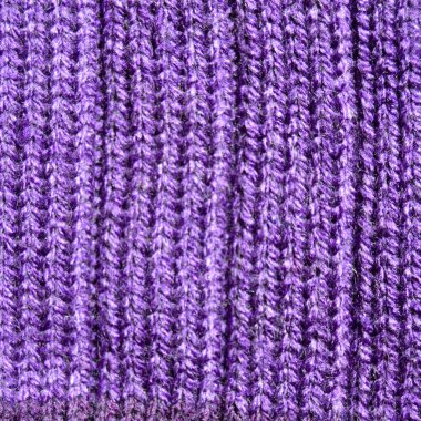 Yünden desenli kumaş. El yapımı kumaş mor yün arkaplan dokusu