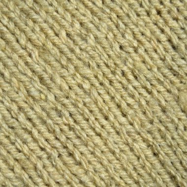 Yünden desenli kumaş. El yapımı kumaş bej rengi yün arkaplan dokusu