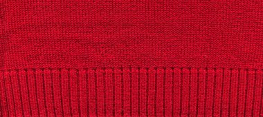 Yünden desenli kumaş. El yapımı kumaş, kırmızı yün arkaplan dokusu