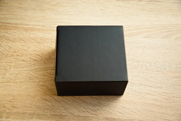 Closed Black Rectangular Cardboard Box Corrugated Cardboard Lid Oak Wooden — Stockfoto