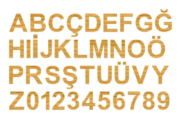 从木制竹子上剪下来的字母和数字字符 由大写字母和土耳其语字母字符中使用的数字组成 用白色背景隔开 — 图库照片