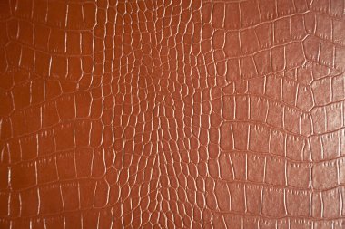 Tekstil endüstrisinde kullanılan çok lüks kahverengi timsah deri dokusu, taklit deri.