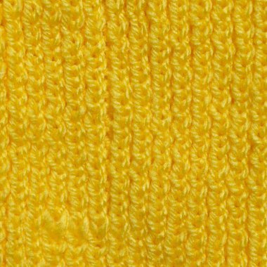 Yünden desenli kumaş. El yapımı örgü kumaş sarı yün arkaplan dokusu