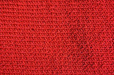 Yünden desenli kumaş. El yapımı kumaş, kırmızı yün arkaplan dokusu
