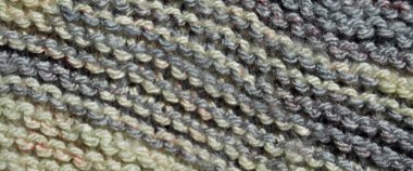 Yünden desenli kumaş. El yapımı örgü kumaş gri yün arkaplan dokusu