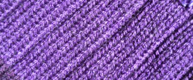 Yünden desenli kumaş. El yapımı kumaş mor yün arkaplan dokusu