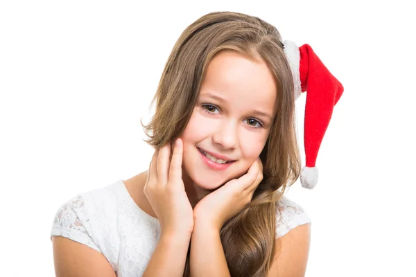 Hermosa chica con gorra roja de Navidad en blanco aislado — Foto de Stock
