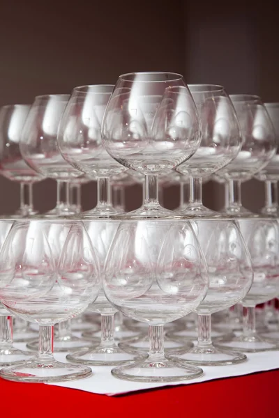 Empty glasses for cognac on festive table — Stock Photo, Image