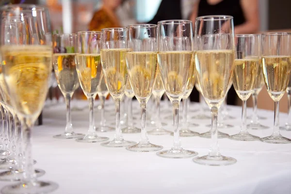 Glasses of champagne on festive table — Stock Photo, Image