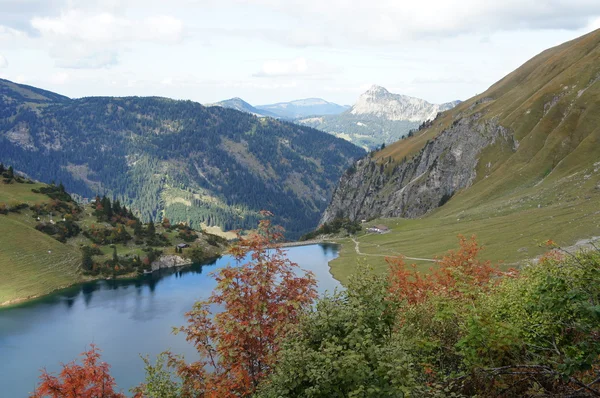 A small dam lake in the Allgäu Alps — Stok fotoğraf