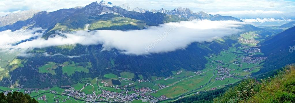 A veil of clouds over the valley
