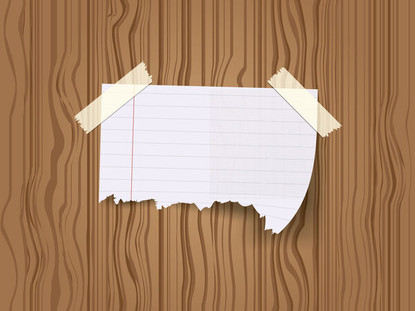 Ripped pieces of paper sticked with adhesive tapes