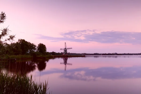 Dutch windmill at sunset — Stock Photo, Image