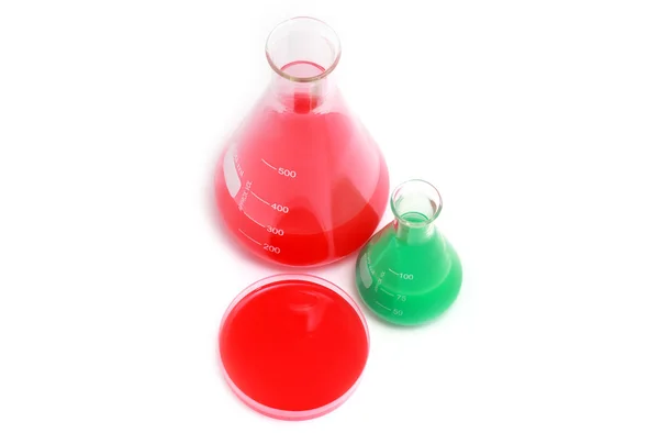 Laboratory flasks with chemical solutions — Stock Photo, Image