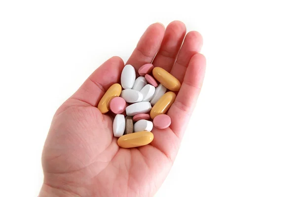 Different pills in arm — Stock Photo, Image