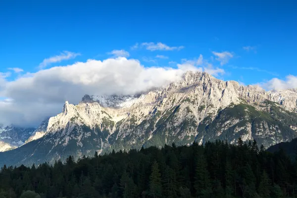 Mountain peaks in the clouds — Stock Photo, Image