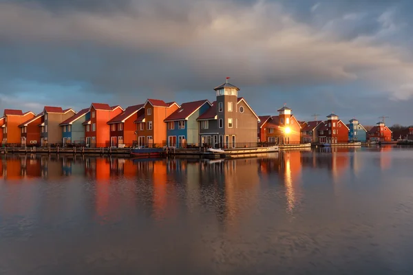 Colorful buildings on water — Stock Photo, Image