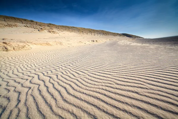 Texture des vagues de sable sur la plage de la mer du Nord — Photo