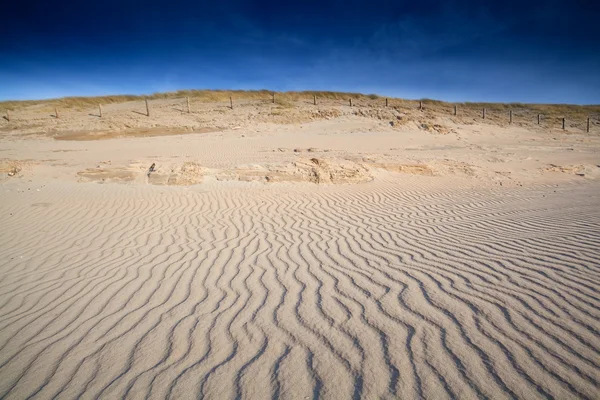 Piasek fala tekstura ob plaży nad Morzem Północnym — Zdjęcie stockowe