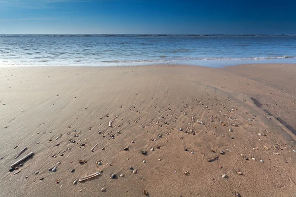 Piasek plaża na Morzu Północnym w czasie odpływu — Zdjęcie stockowe