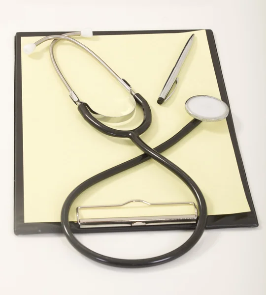 Medical Stethoscope with Pen on Medical File Folders — Stock Photo, Image